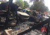 Mechanic shop fire burns five cars, house
